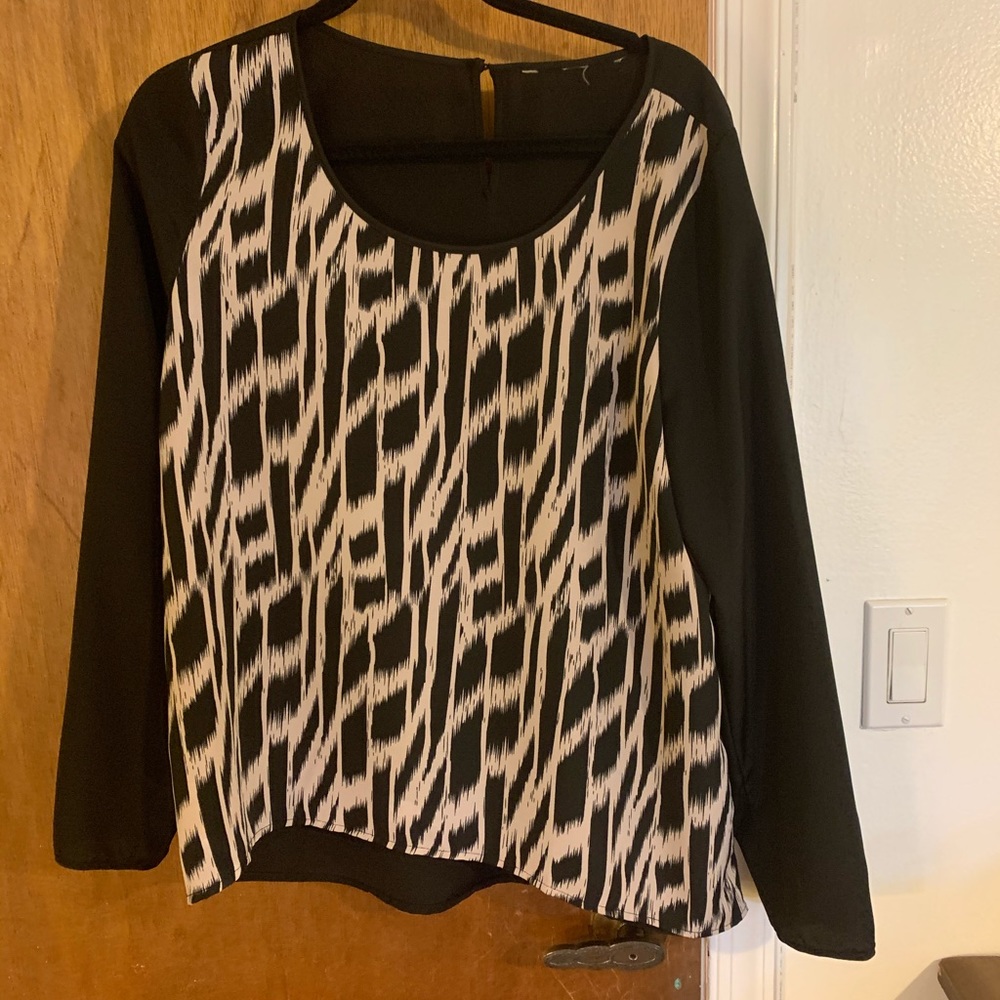 Black/tan blouse w animal print. Size Large